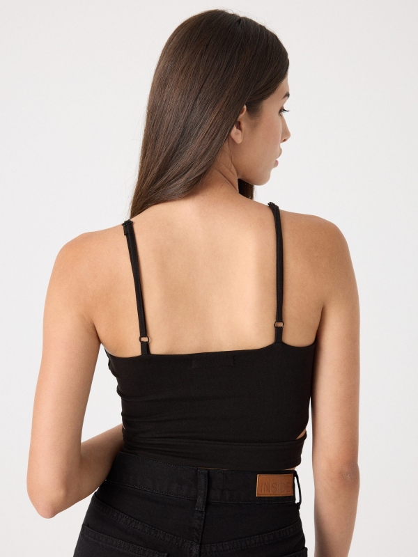 Top cropped cut out negro vista media trasera