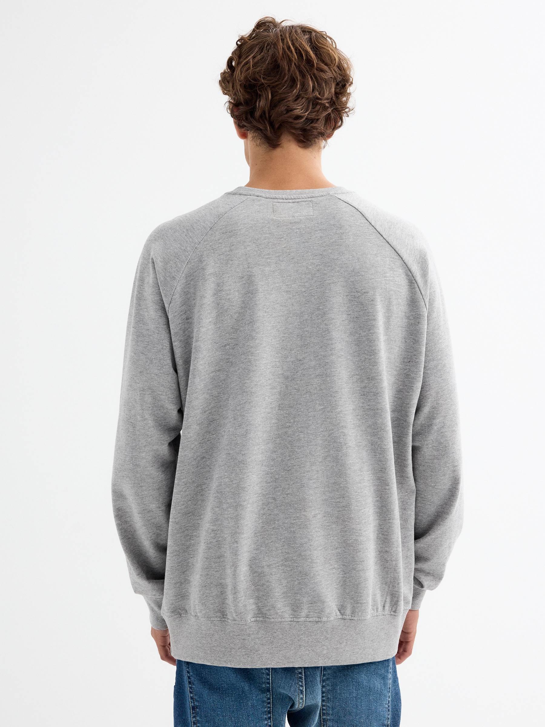 Camisola básica com texto cinza melange vista meia frontal