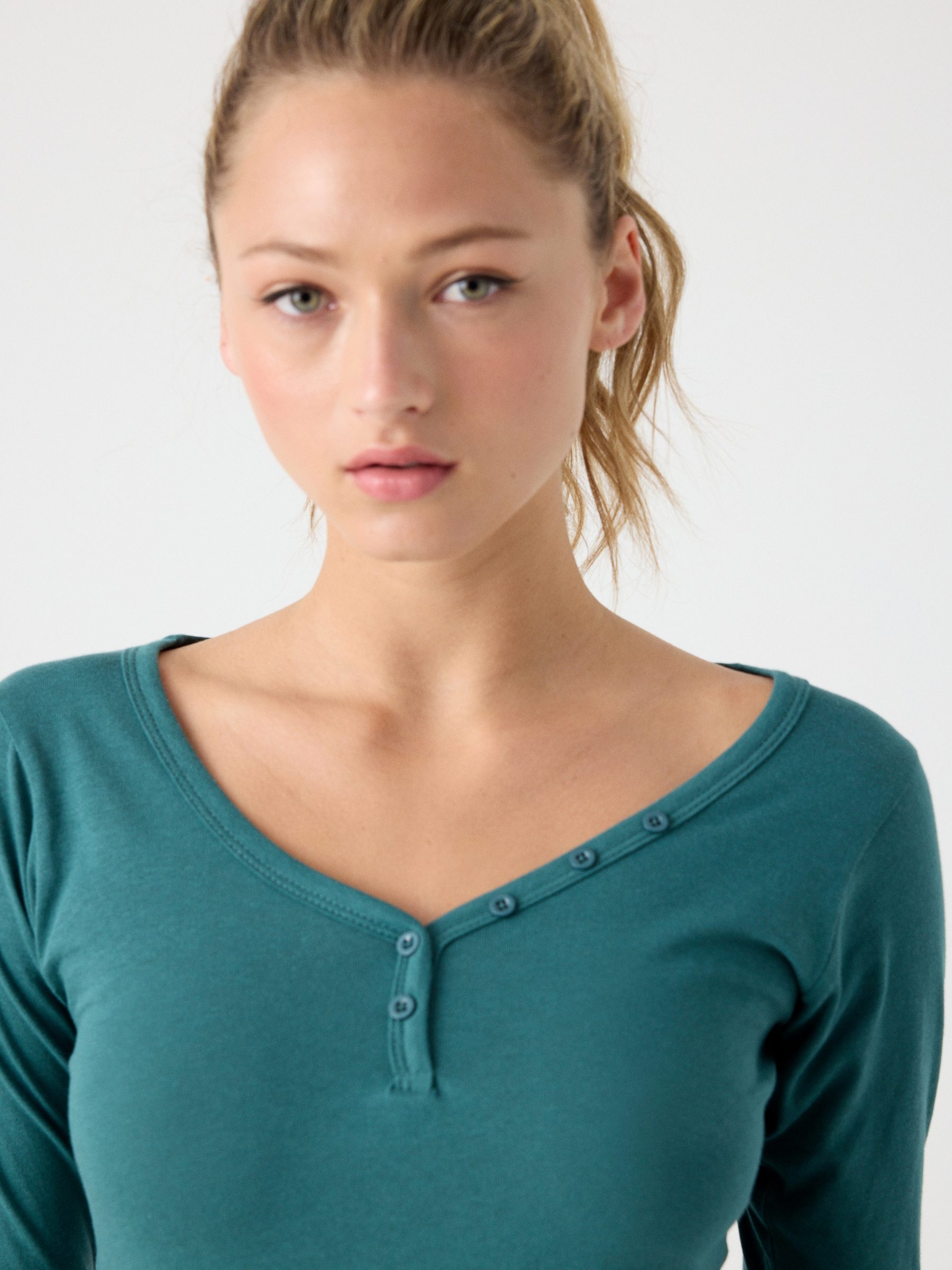 V-neck T-shirt with buttons green middle front view