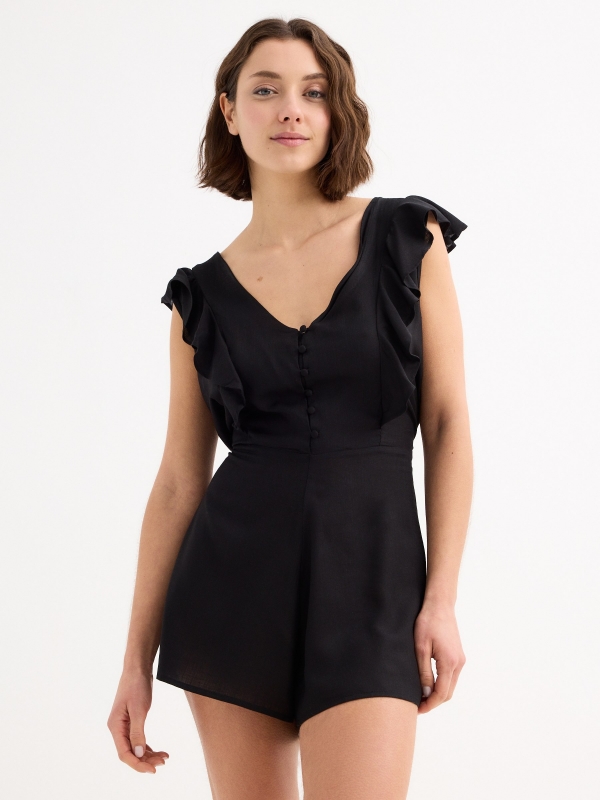 Short jumpsuit with buttons black middle front view