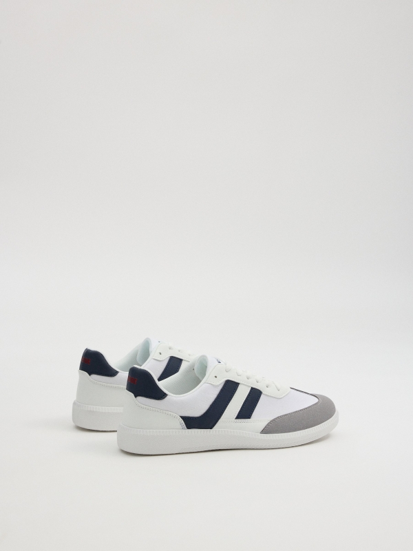 Zapatilla loneta bicolor blanco vista trasera 45º