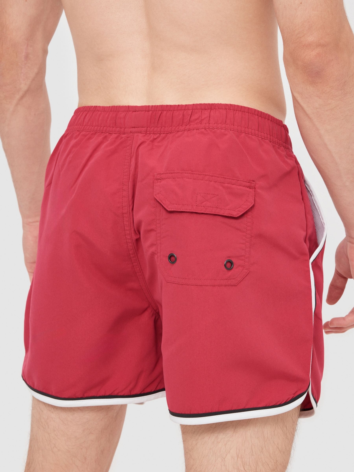 Swimsuit contrast trim red detail view