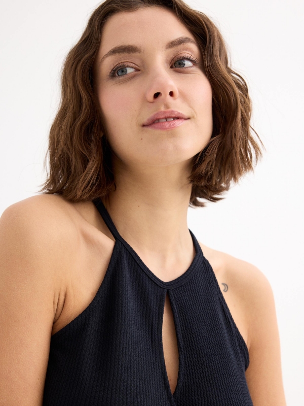 Crossed halter top black detail view