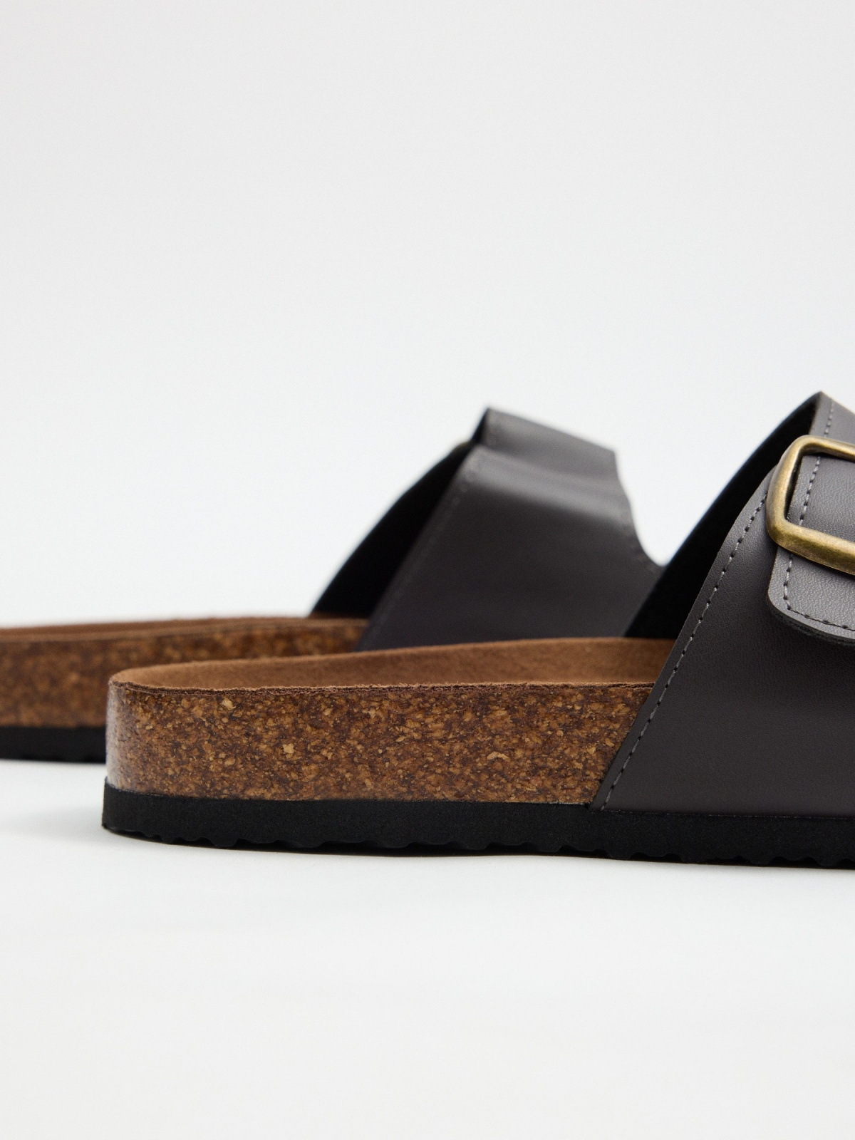 Open sandal buckles brown detail view