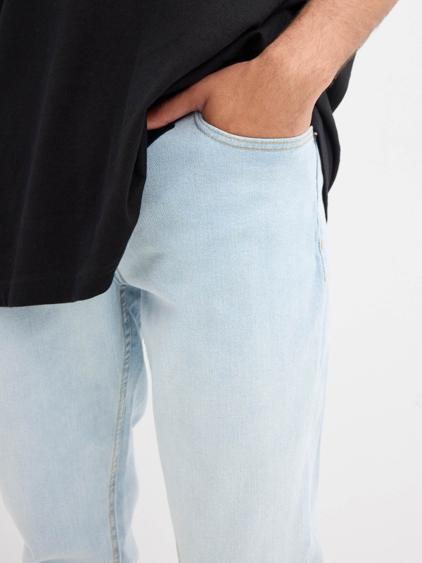 Light blue regular jeans with stitching blue detail view