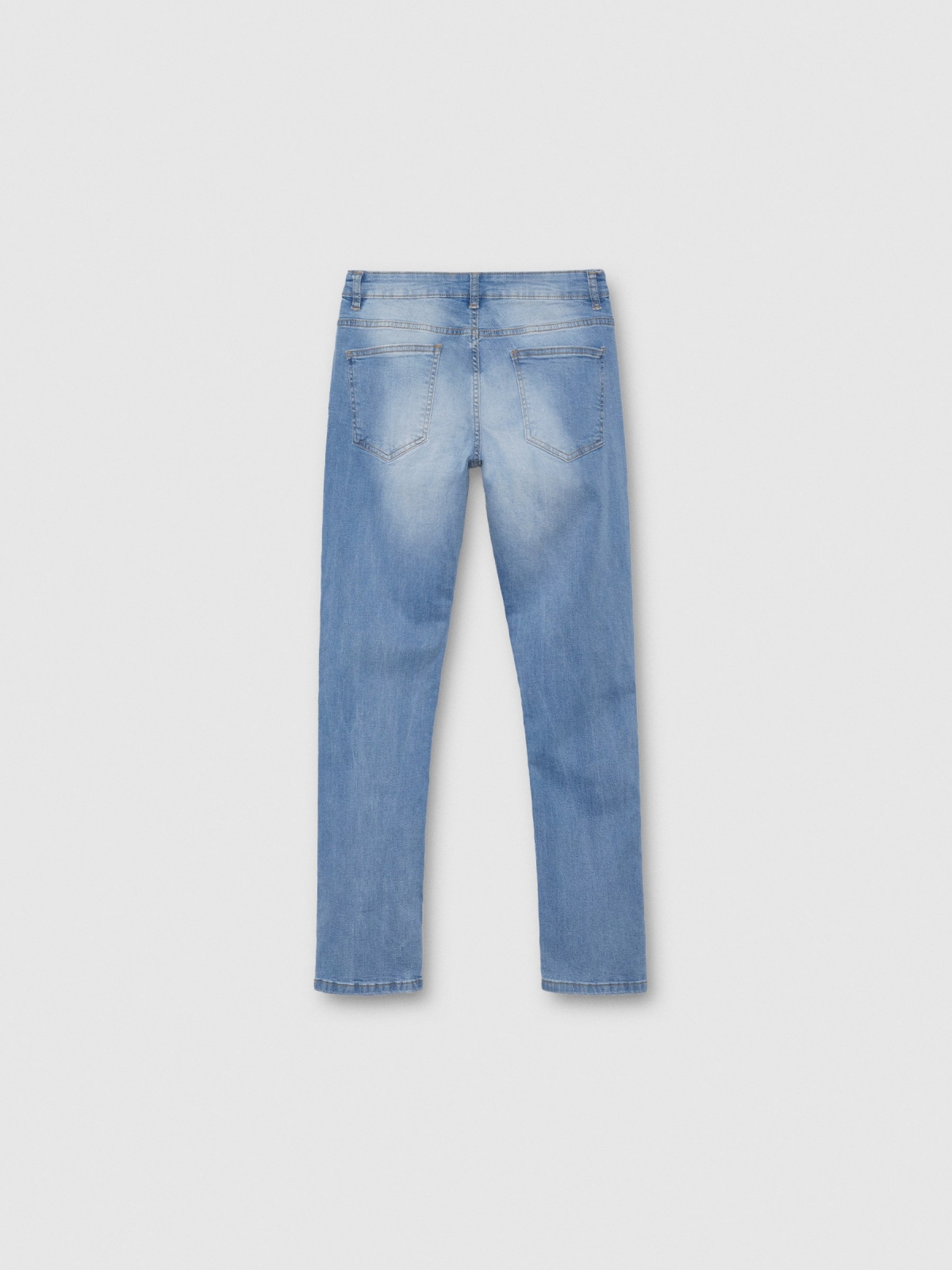 Light blue slim jeans with a worn effect blue back view
