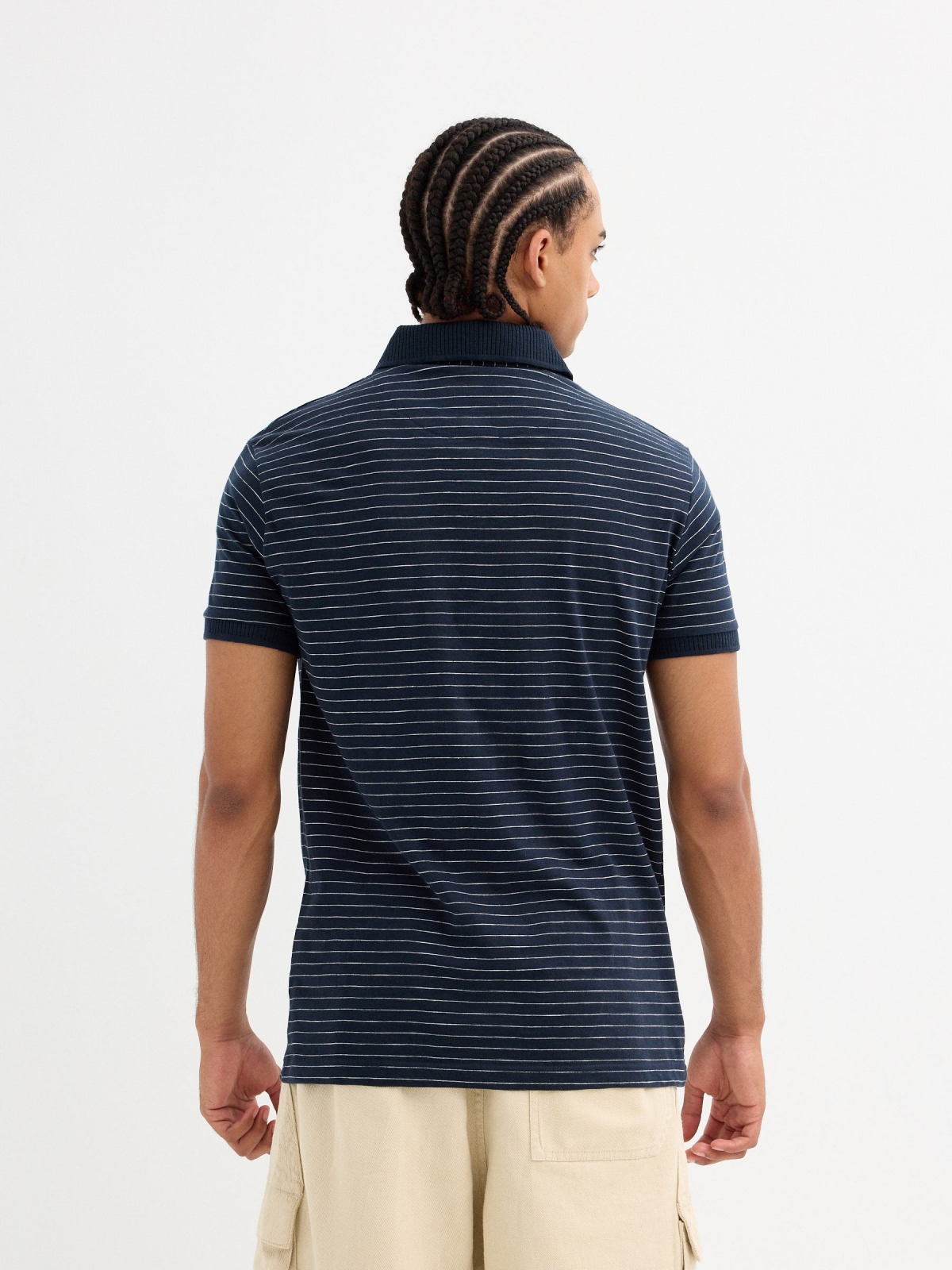 Striped polo navy middle back view