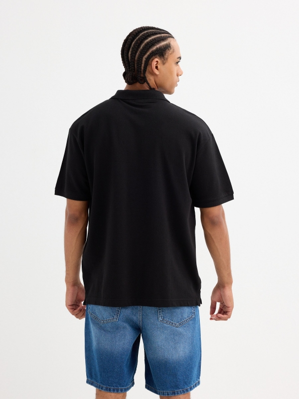 Basic polo black middle back view