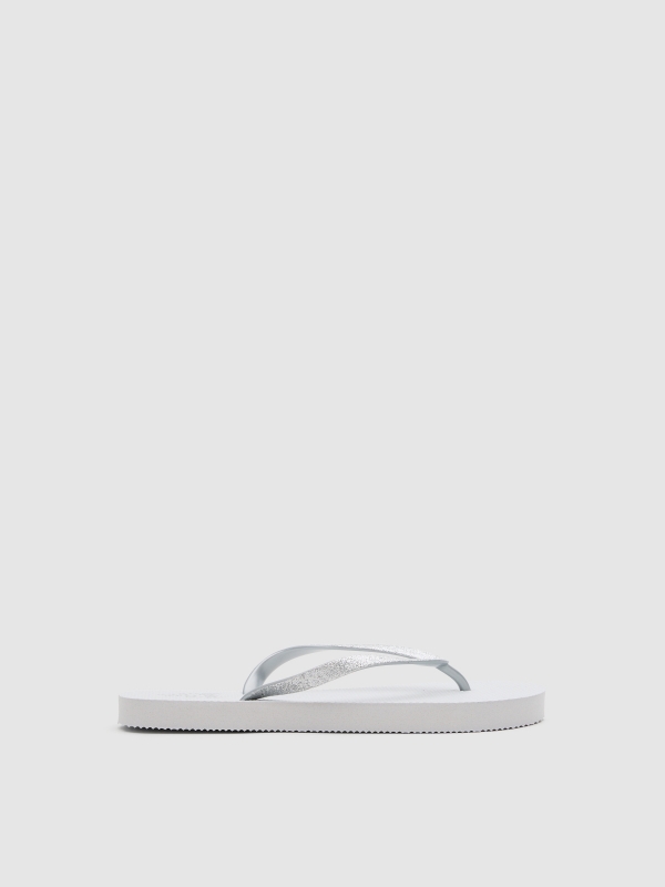 Chanclas dedo blanco blanco vista lateral