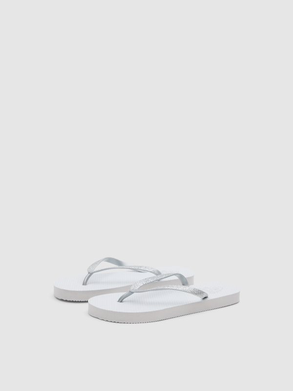 Chanclas dedo blanco blanco vista frontal 45º