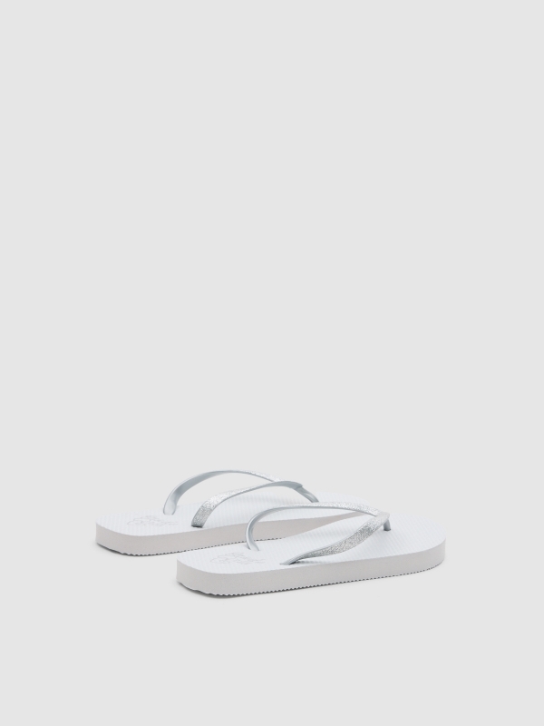 Chinelos dedo branco branco vista traseira 45º