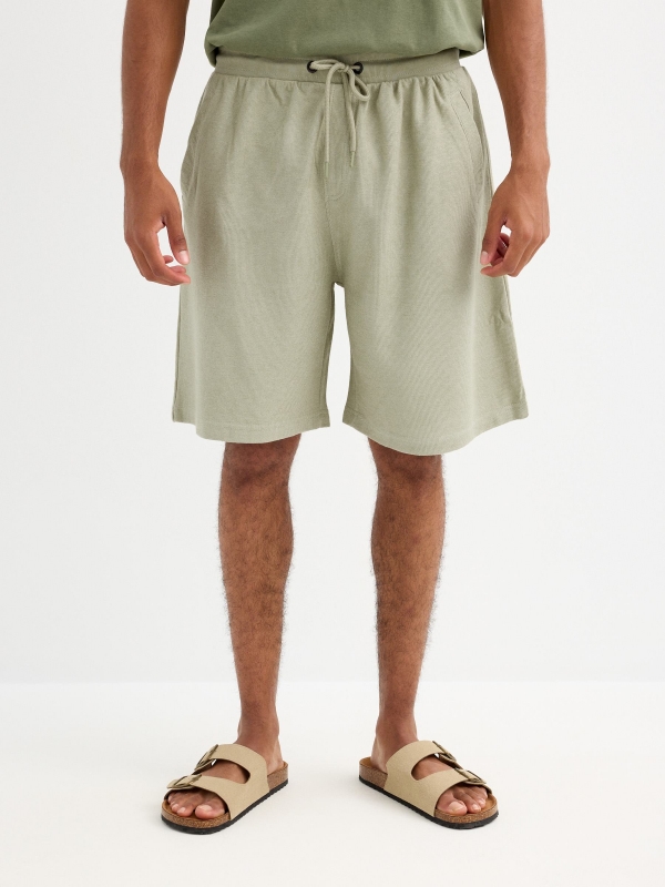 Plain sports Bermuda shorts greyish green front view