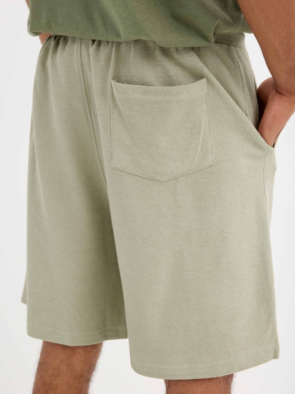 Plain sports Bermuda shorts greyish green detail view