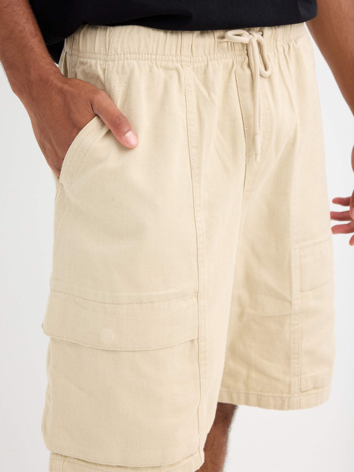 Bermuda super baggy crudo vista detalle