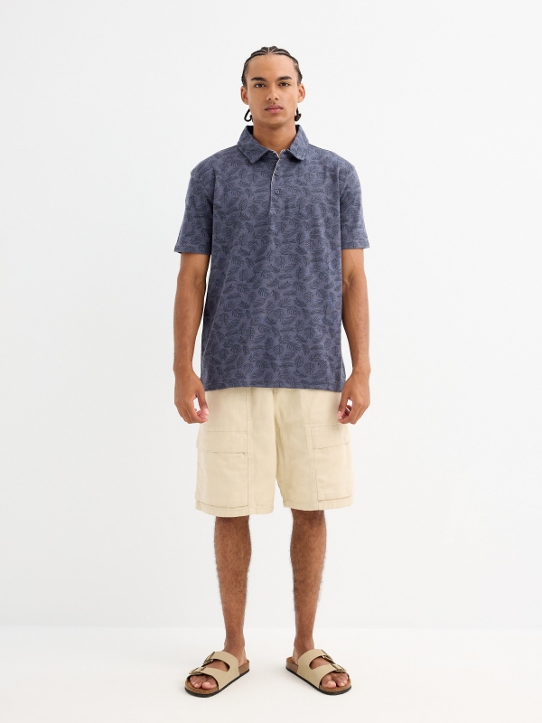 Polo estampado hojas azul marino vista general frontal