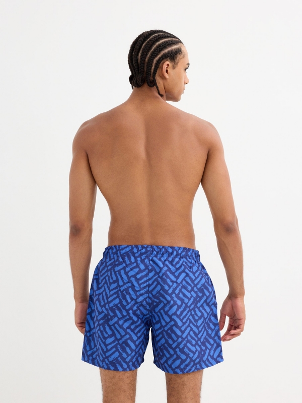 Geometric print swimsuit blue middle back view