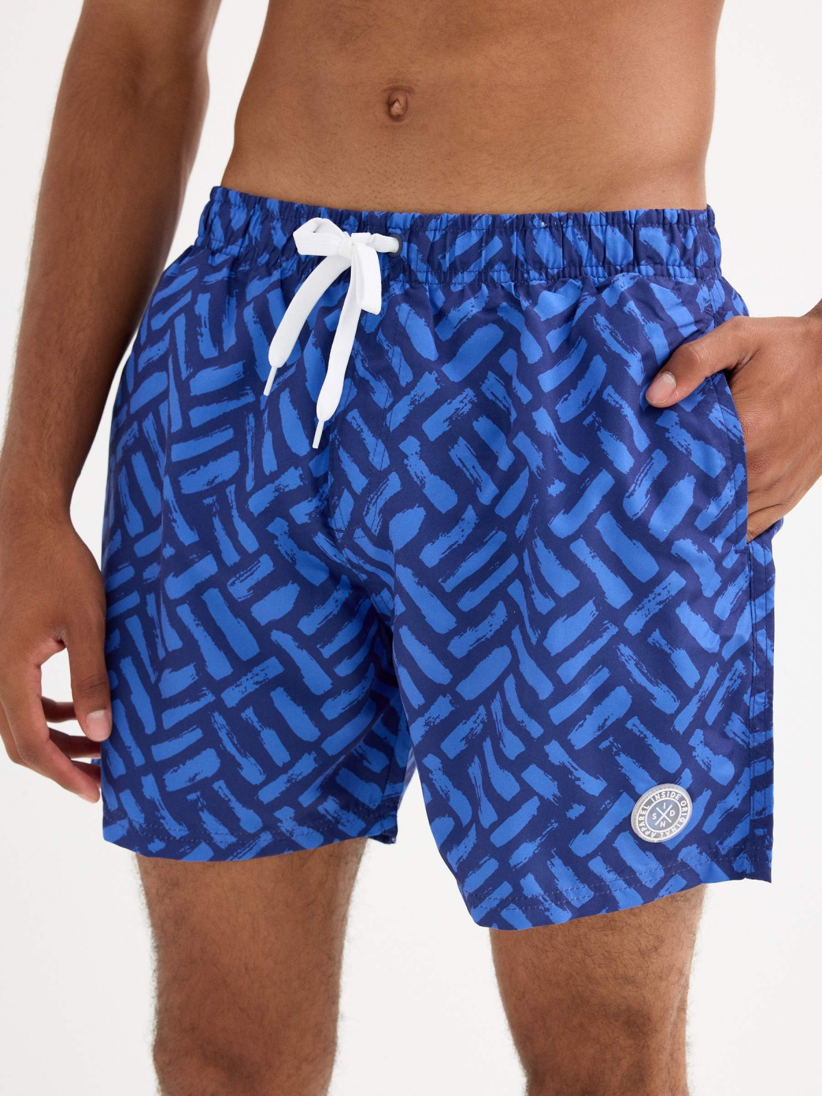 Geometric print swimsuit blue detail view