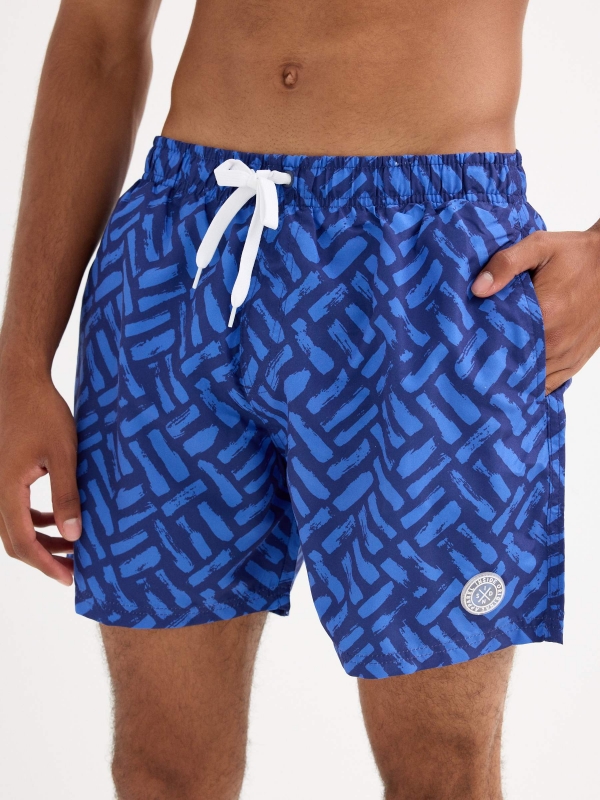 Geometric print swimsuit blue detail view