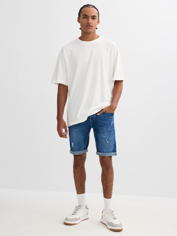 Ripped distressed denim bermuda short blue middle front view