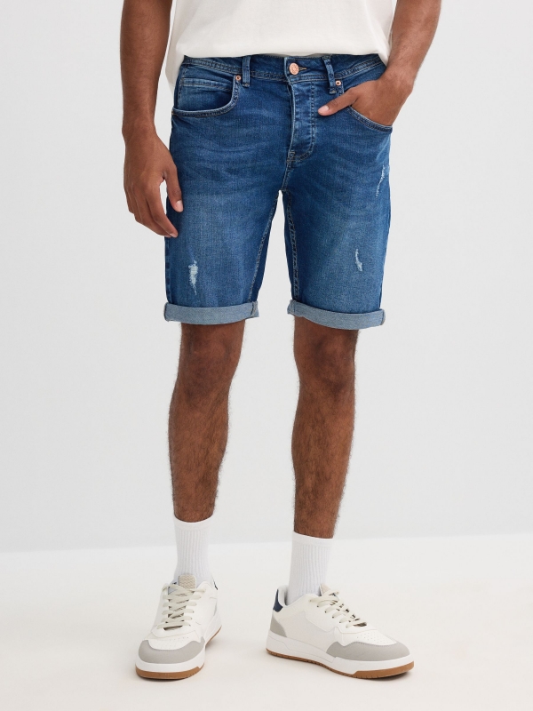 Ripped distressed denim bermuda short blue front view