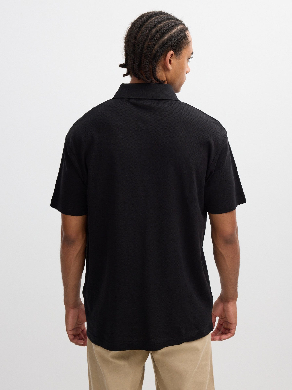 Basic textured polo black middle back view