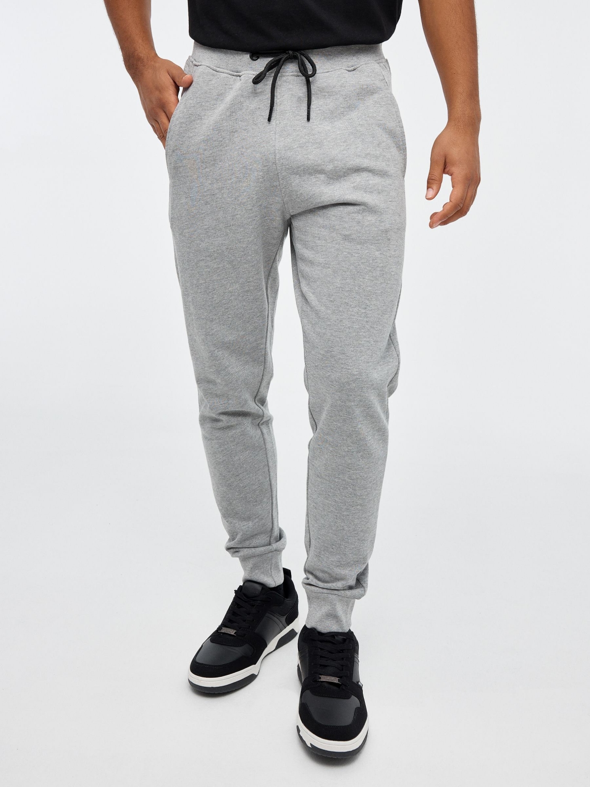 Pantalón jogger sport gris melange vista media frontal