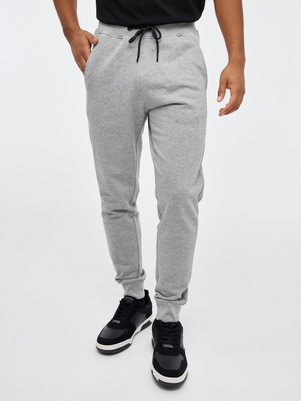 Pantalón jogger sport gris melange vista media frontal