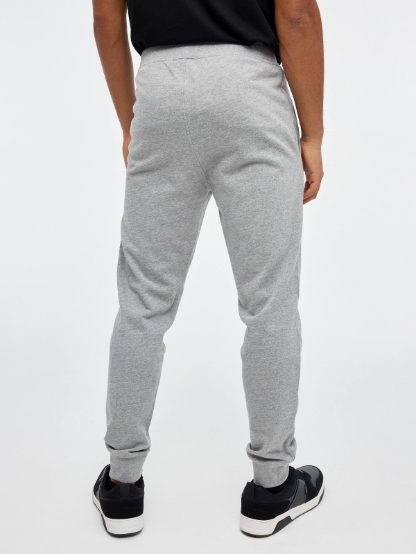 Pantalón jogger sport gris melange vista media trasera