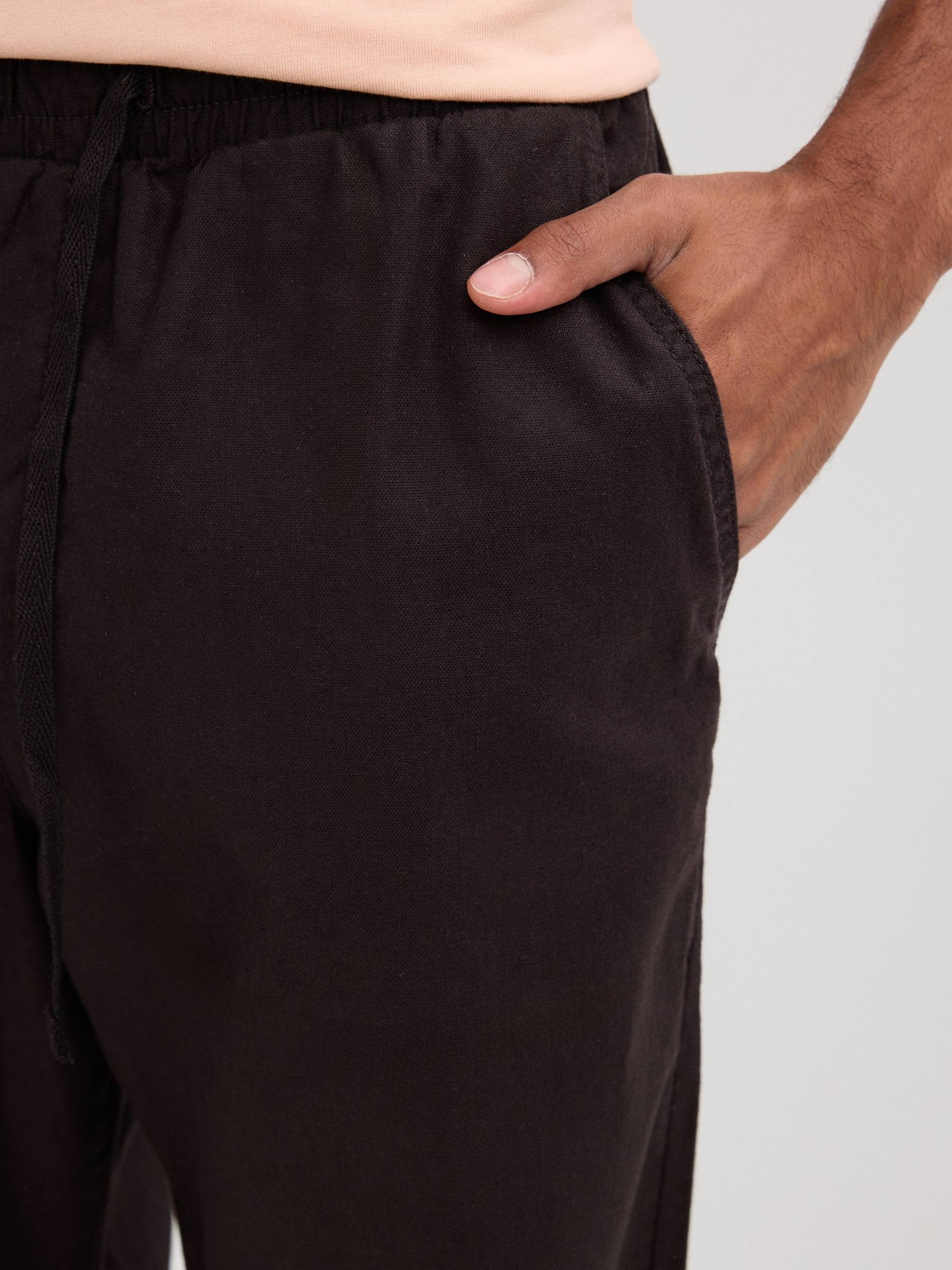 Linen pants black front view