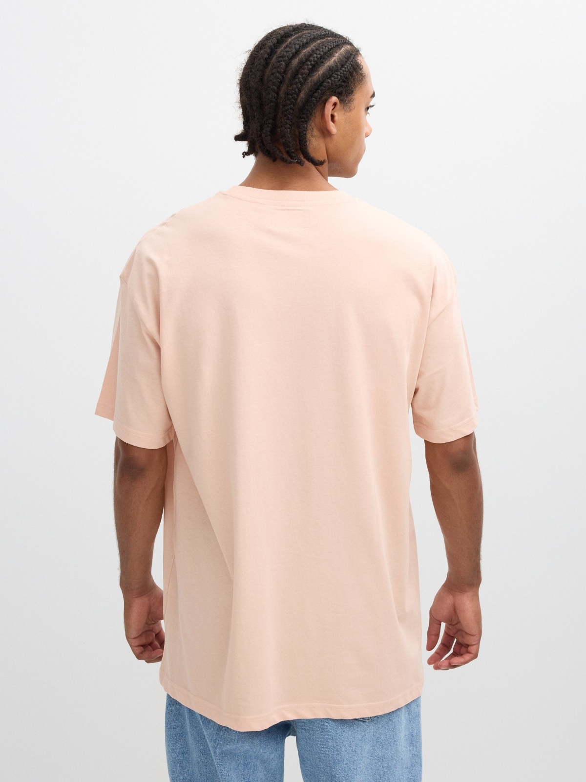 Camiseta estampado texto Inside rosa nude vista media trasera