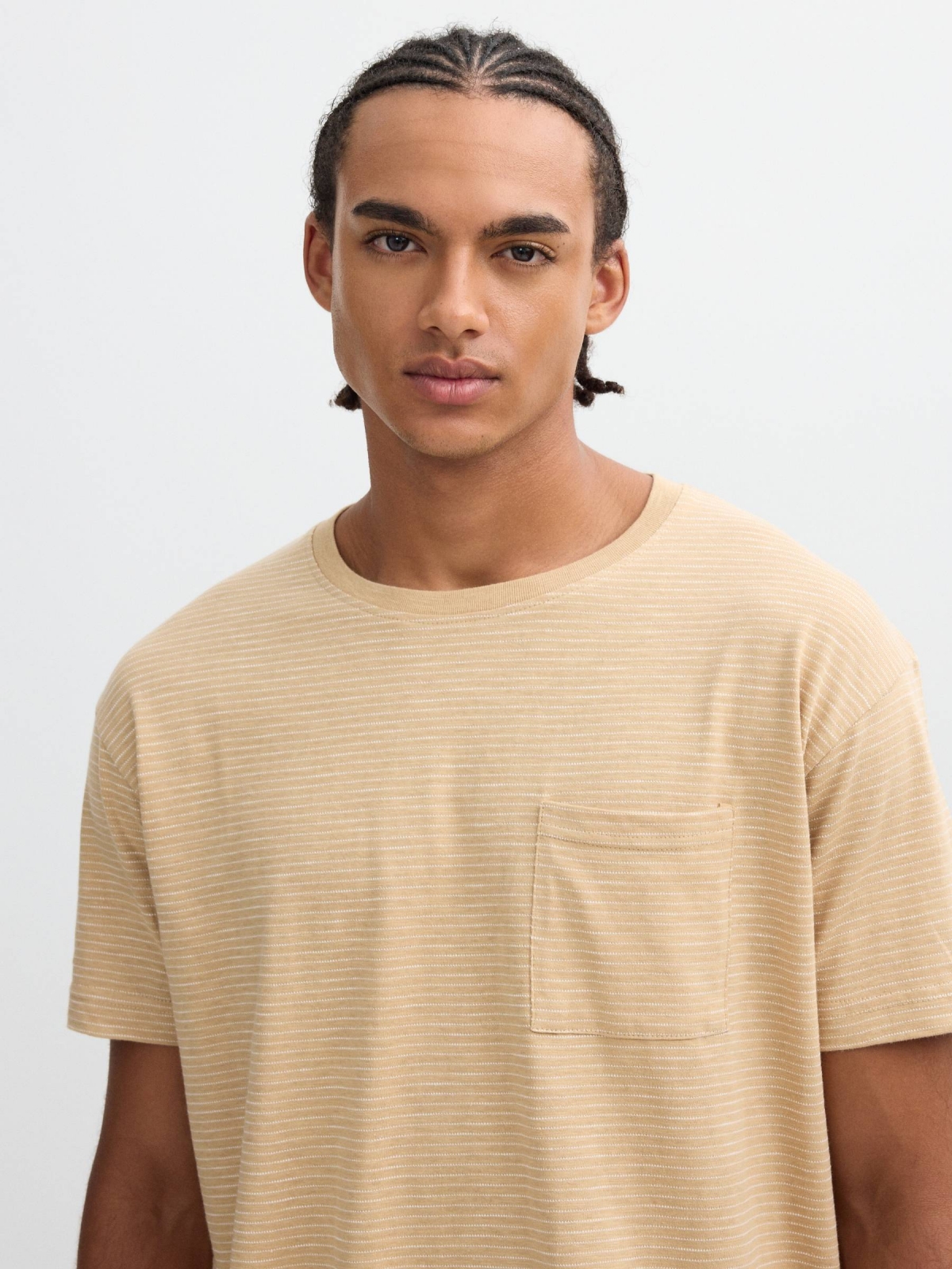 Striped print t-shirt with pocket sand detail view