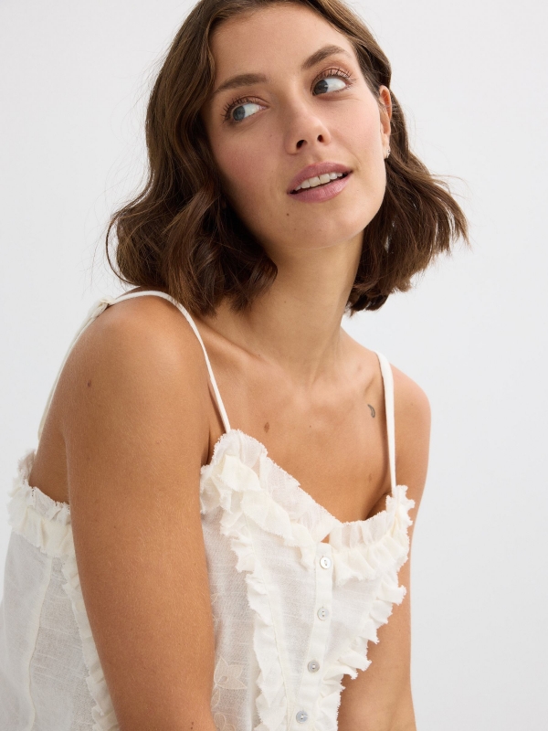 Embroidered strap top off white detail view