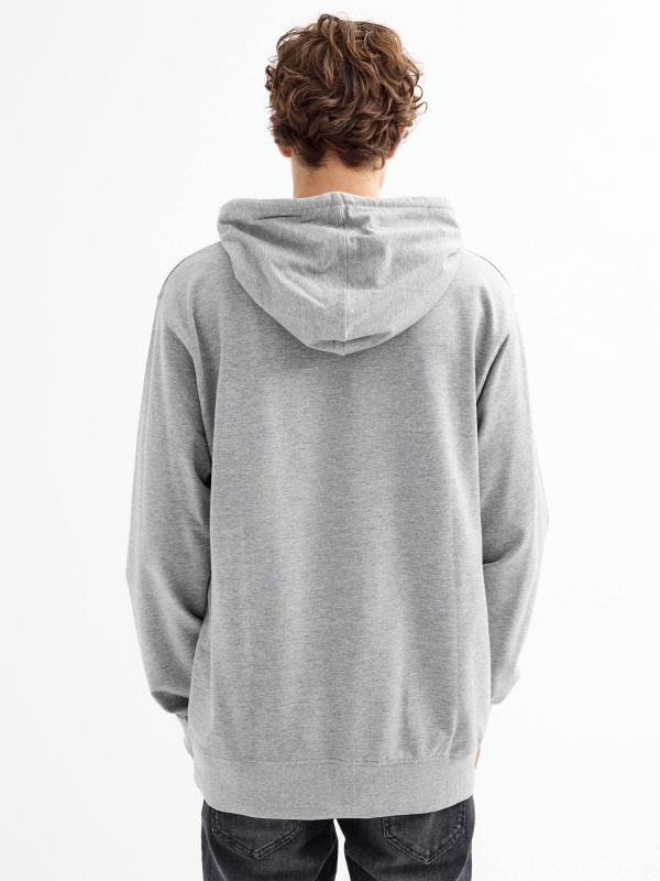 Sudadera canguro con logo gris melange vista media trasera