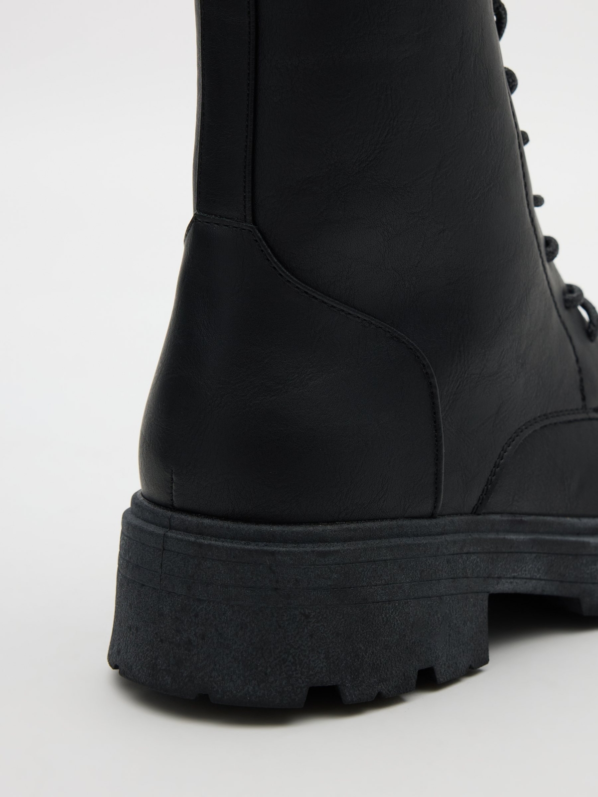 Lace-up track sole boot black detail view
