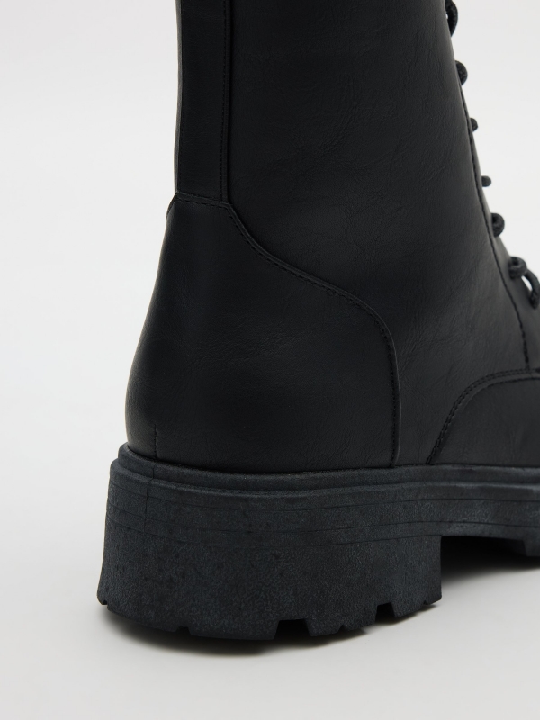 Lace-up track sole boot black detail view