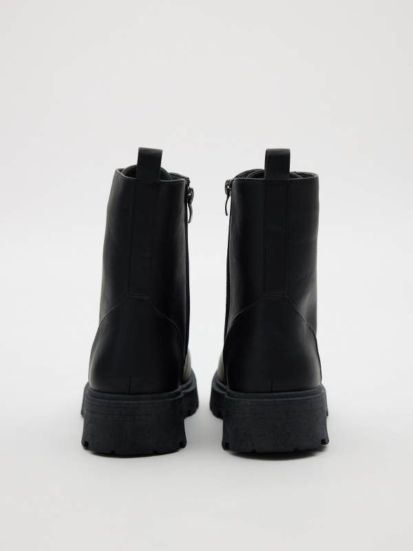 Lace-up track sole boot black detail view