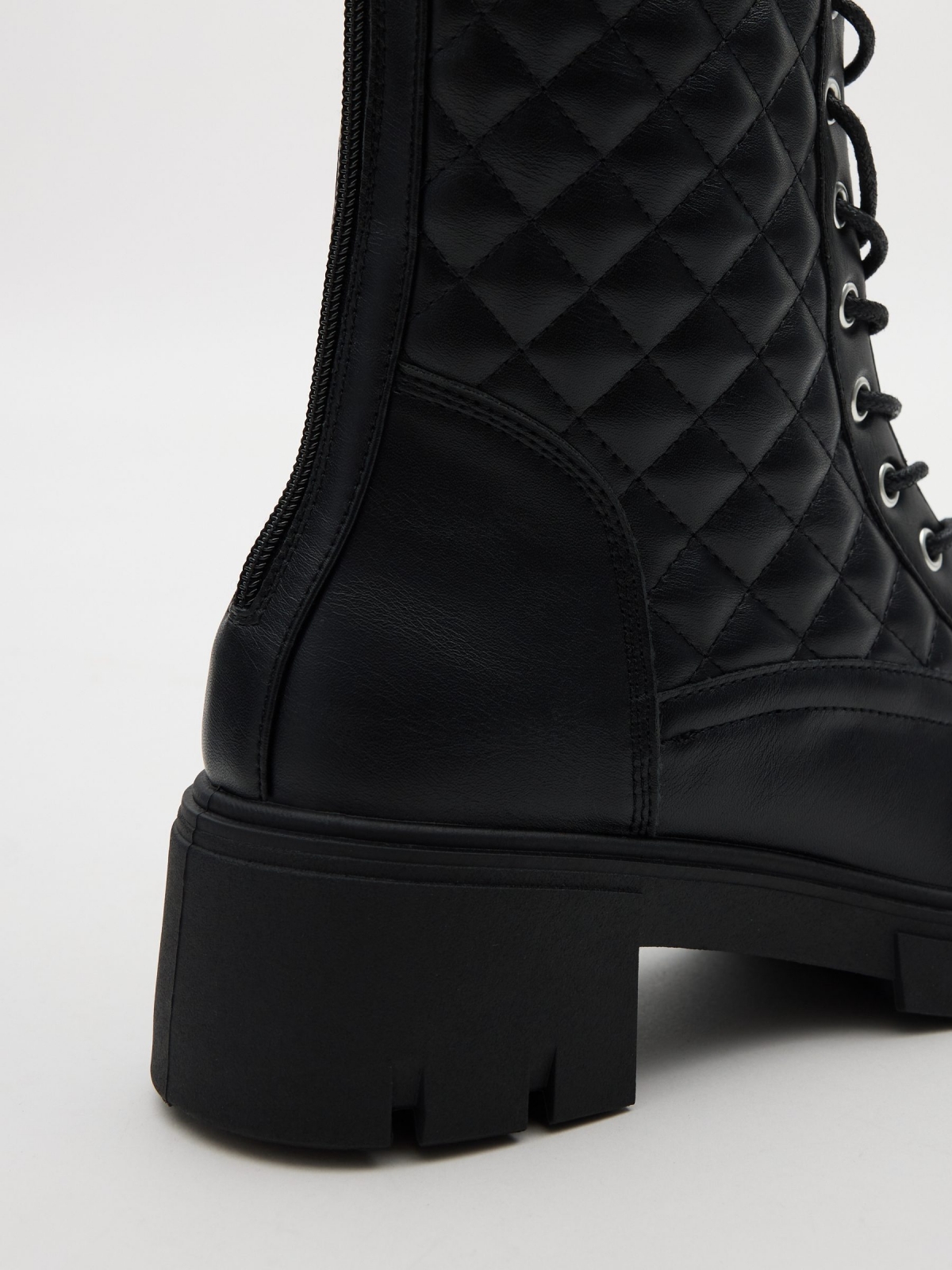 Quilter lace-up boot black detail view