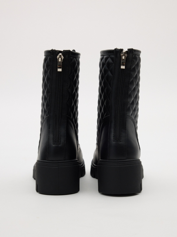 Quilter lace-up boot black detail view
