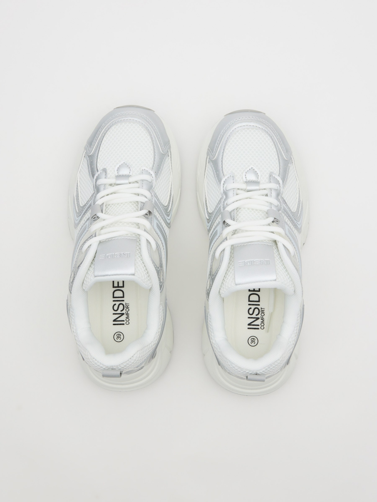 Zapatillas running metalizado blanco vista cenital