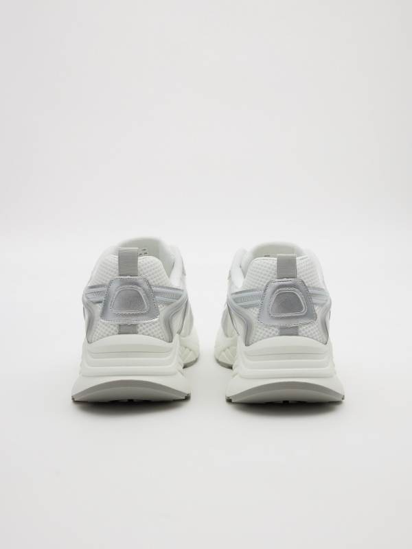 Zapatillas running metalizado blanco vista detalle
