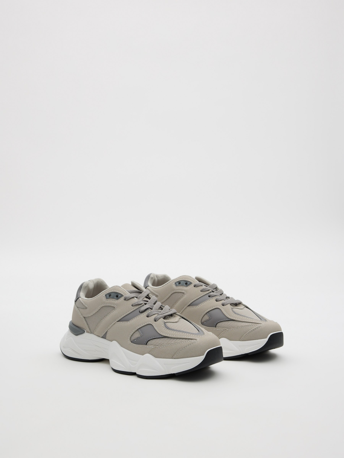 Zapatillas running gris gris medio vista frontal 45º
