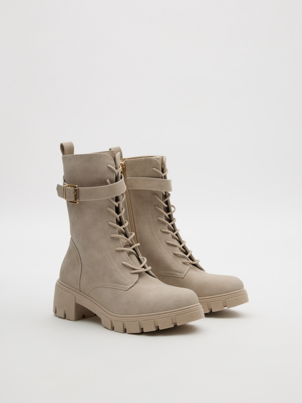 Lace-up boots with buckle raw 45º front view