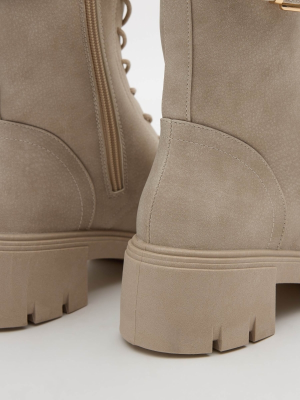 Lace-up boots with buckle raw detail view