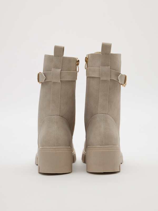 Lace-up boots with buckle raw detail view