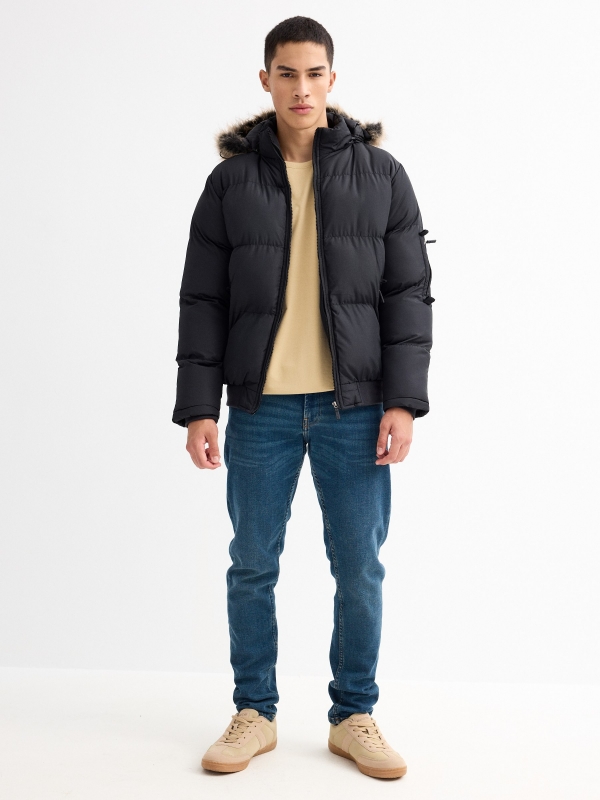 Quilted coat with fur hood black front view