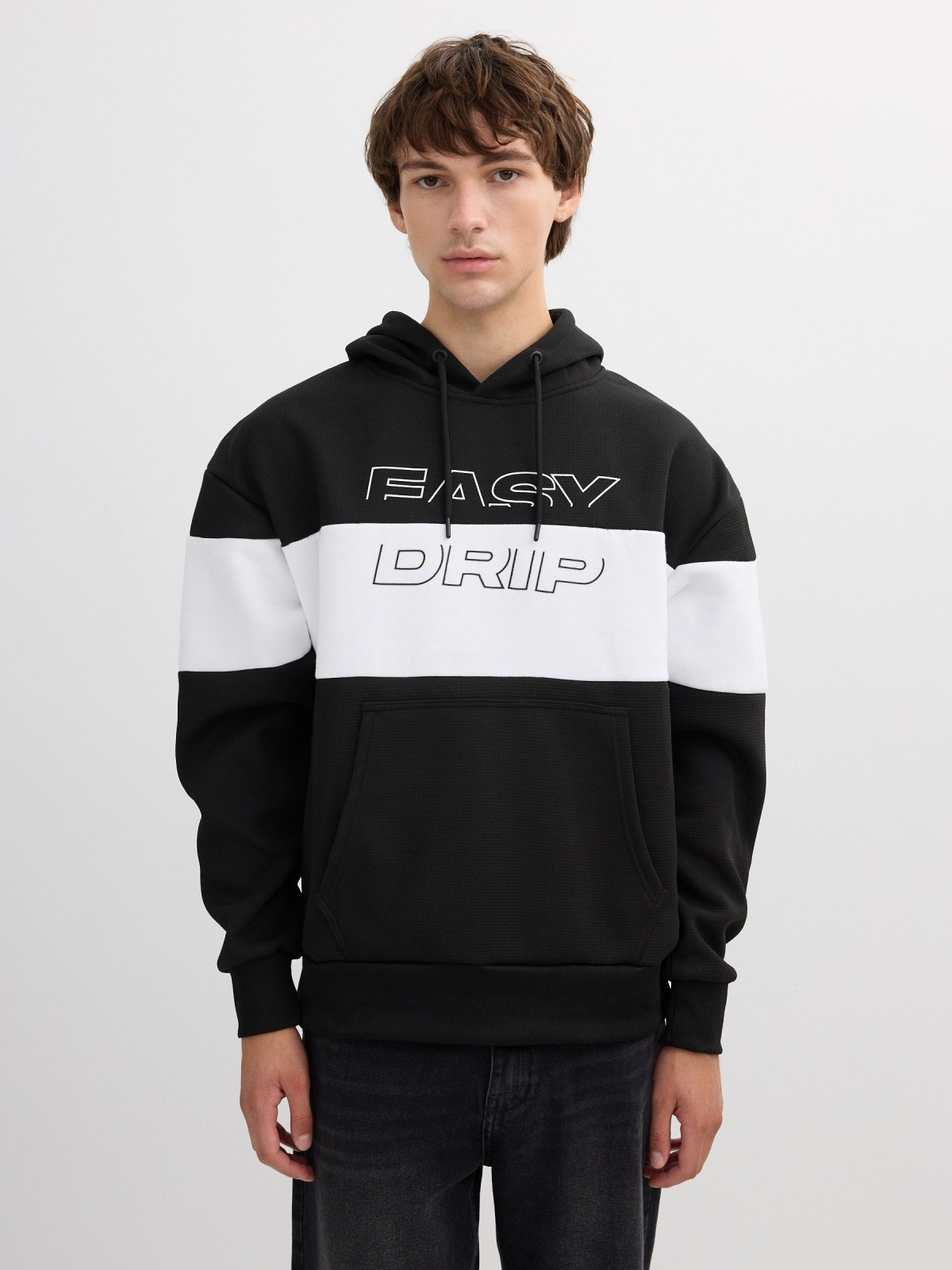 White and black color block hoodie black middle front view