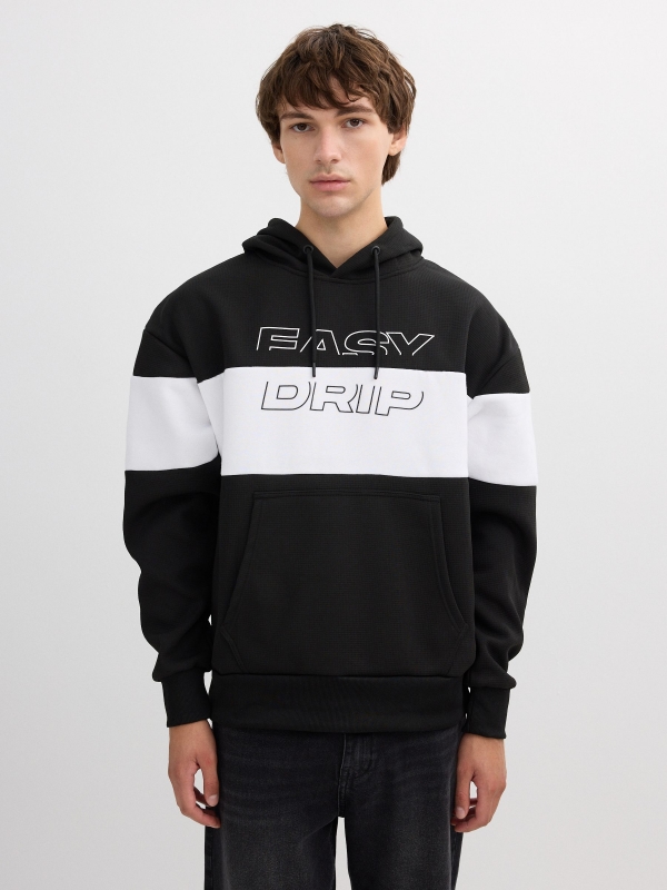 White and black color block hoodie black middle front view