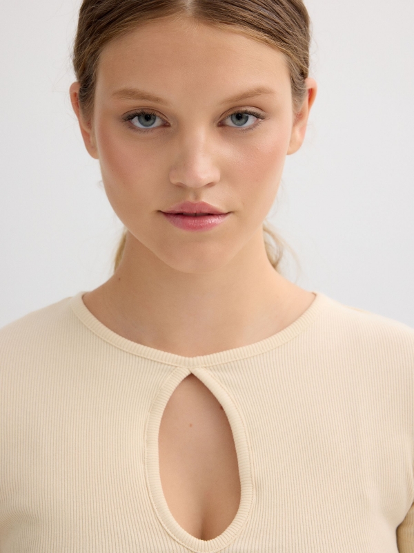 Short sleeve crop cut out t-shirt sand detail view