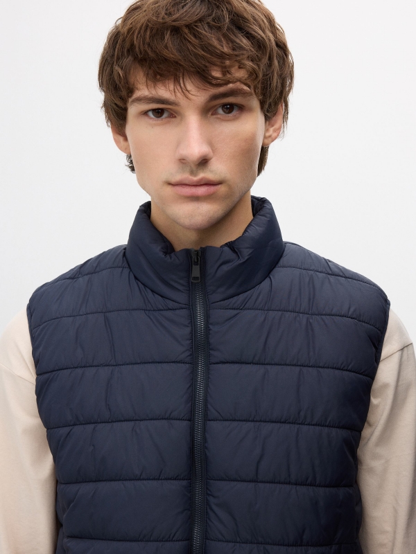 Padded vest navy detail view
