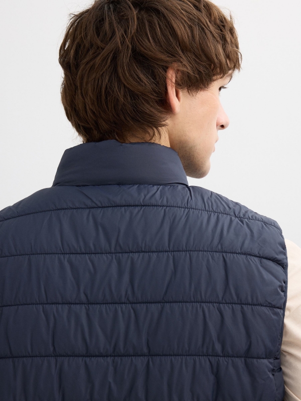 Padded vest navy detail view